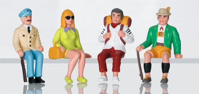 Set of Seated Tourist Figures
